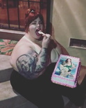 WATCH Tess Holliday Trolls Her Haters by Eating a Cake Repli
