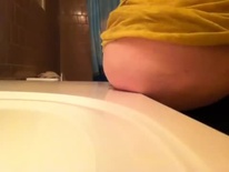 Belly plop on bathroom counter