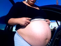 Parking lot pregnant belly