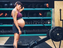 pregnant woman using rower at gym-732x549-thumbnail-732x549